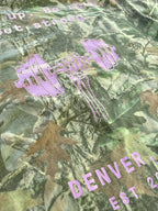 Detail of the skeleton-hand barbell graphic on the back