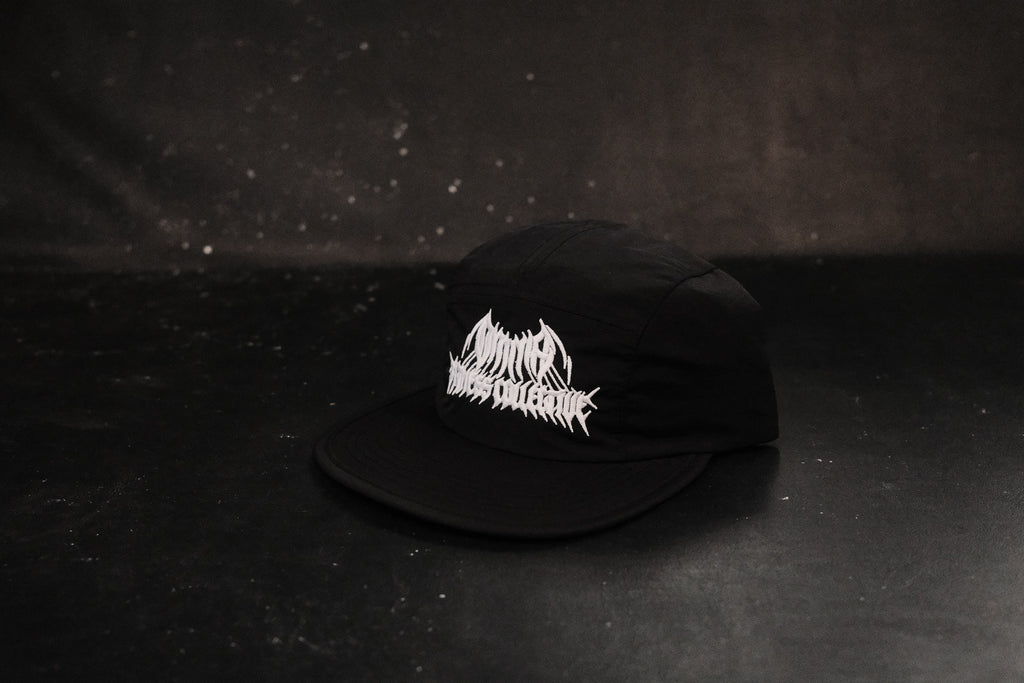 Black Omnia Metal Logo running hat, side view