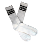 Pair of white Omnia Crew Socks crossed